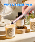 Chic Electric Candle Lighter Gift For Women, Perfect Stocking Stuffer And Holiday Present being used to light a candle.