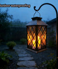 Flickering Lantern With 3 Flameless Candles, Waterproof PVC Garden Hanging Lights glowing in rainy garden at night