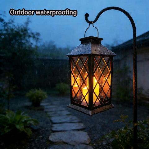 Flickering Lantern With 3 Flameless Candles, Waterproof PVC Garden Hanging Lights glowing in rainy garden at night
