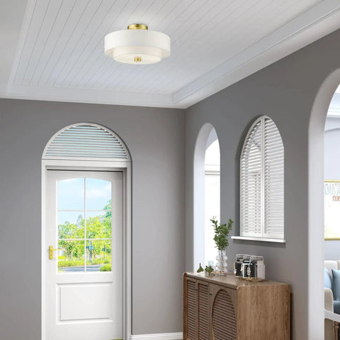 Meridian Collection 3 Light Satin Brass Semi Flush Mount Ceiling Light With Off White Hardback Fabric Shade in living room setting.