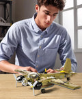 Man assembling JU88 Junkers Bomber Plane Building Set With 430 Plus Pieces Epic WWII German Fighter Model For History Buffs Great Holiday Gift For Display Fans And Family Build Time