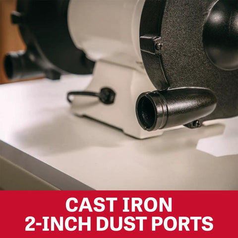 Grit And Grind Eight Inch Bench Grinder With Beefy Half Hp Motor Runs Steady At 1725 Rpm showing cast iron 2-inch dust ports for efficient debris management.