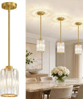 Straight Up Three Pack Brushed Gold Crystal Pendant Lights For Kitchen Islands, top view showing glass shades and gold finish.