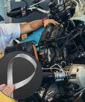 Hella Rugged Engine Chassis Grounding Cable Kit Features Eight Thick Silver Straps In Four Sizes shown during vehicle maintenance.