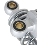 Close-up of Chrome Motorcycle Rear Shock Absorber 320mm Replacement for XL883 1200 72 48 RD350 G1 GS125 150cc, showing end eyelet and spring.