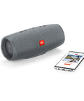 Go Anywhere Waterproof Portable Bluetooth Speaker With 20 Hour Battery Life USB Fast Charging IPX7 Rugged Gray next to smartphone