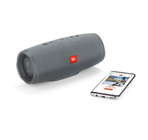 Go Anywhere Waterproof Portable Bluetooth Speaker With 20 Hour Battery Life USB Fast Charging IPX7 Rugged Gray next to smartphone