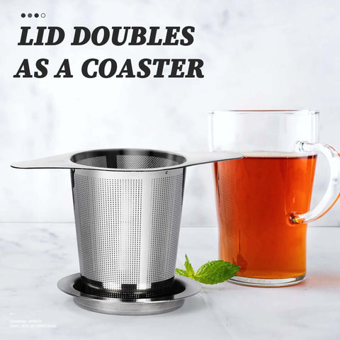 Extra Fine 18 8 Stainless Steel Tea Infuser Mesh Strainer With Large Capacity And Durable Double Handles next to a glass of tea