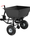 Beefy Built Tow Behind Broadcast Spreader For Lawn And Garden With 130 Lb Capacity, heavy-duty metal hopper, and 10-inch pneumatic tires.
