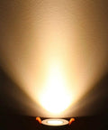 2 Inch LED Dimmable Downlight With 3W COB, Recessed Ceiling Light casting warm white glow on wall
