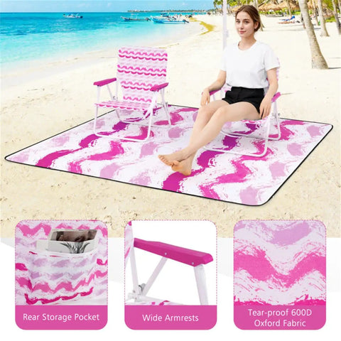 Person relaxing on Six Point Two Foot Beach Umbrella With Two Folding Chairs And Waterproof Blanket Grab And Go Pink 4 Piece Beach Set