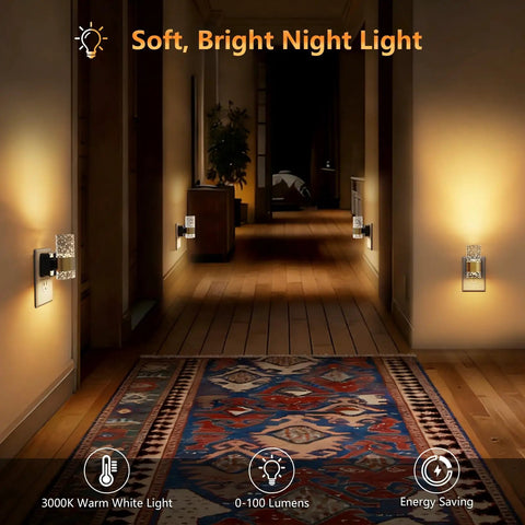 Straight Up Easy Dusk To Dawn Plug In Night Light With Smooth Slide Dimmer And Auto Sensor Zero Stress Setup For Hallway Bedroom Energy Saving LED Wall Lamp Top Shelf Two Pack installed in a hallway, emitting warm 3000K light.