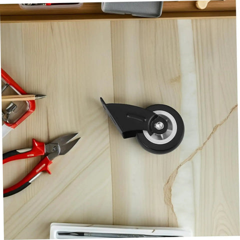 Four Piece Heavy Duty Sliding Door Roller Wheels And Rock Solid Side Mount Casters For Barn Doors on wooden surface with tools.