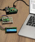 Raspberry Pi Pico Starter Kit With Breadboard I2C 1602 LCD Display Module And 9g Micro Servo for hands-on projects with laptop.