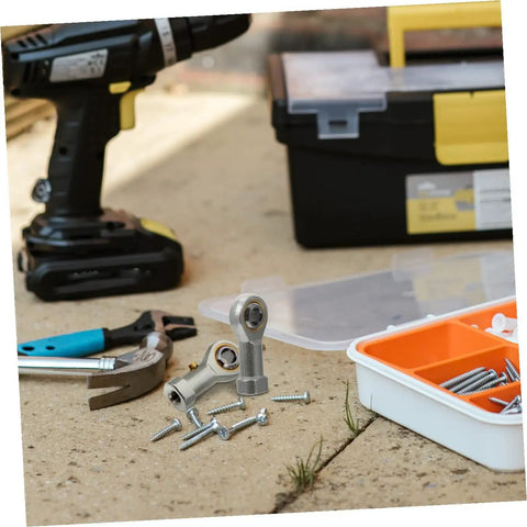 Image of Heavy Duty Threaded Rod End Bearings 4 Pack With Bulletproof Spherical Plain Design, tools, and screws on a work surface.