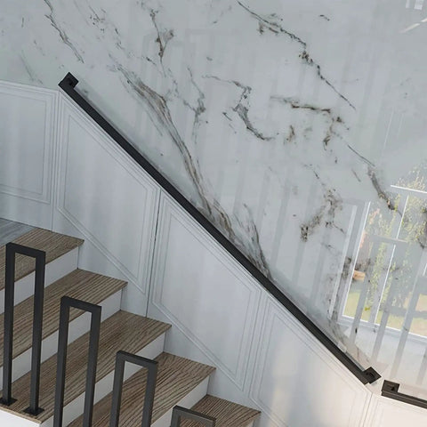 12 Ft Matte Black Wrought Iron Wall Mount Railing Beast Mode Heavy Duty Non Slip Handrail for Stairs Porch Deck Supports 440 Lbs Corrosion Resistant Indoor Outdoor Banister Bad Ass Grip on a modern staircase.