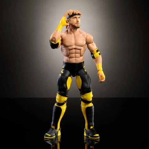 Logan Paul WWE Elite Action Figure With Swappable Hands, Ring Gear, And 25 Points Of Articulation in dynamic pose
