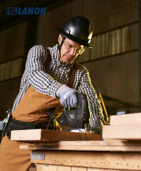Person using jigsaw wearing Full Brim Hard Hat For Worksite Safety OSHA Approved Construction Helmet In Charcoal Gray FRP.