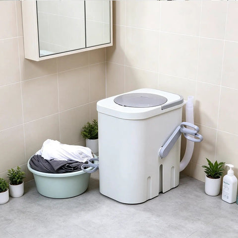 Hand Crank Washing Machine With Biomimetic Scrub Interior Manual Portable Laundry Soaker in bathroom next to laundry basket.