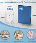 No Sweat Bluetooth Label Maker Mini Thermal Printer Pocket Sized Wireless Labeling Machine next to A5 notebook with dimensions.