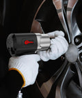 Heavy Duty 1/2 Inch Air Impact Wrench With 1500 Ft-Lbs Torque, 8000 RPM, 4.74 Lb Weight, 1/2 Drive in use on tire rim
