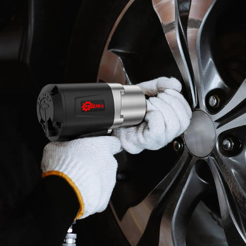 Heavy Duty 1/2 Inch Air Impact Wrench With 1500 Ft-Lbs Torque, 8000 RPM, 4.74 Lb Weight, 1/2 Drive in use on tire rim