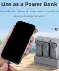 Three Slot Smart Drone Battery Charger Hub For Simultaneous Charging Of Drone Batteries used as power bank outdoors.