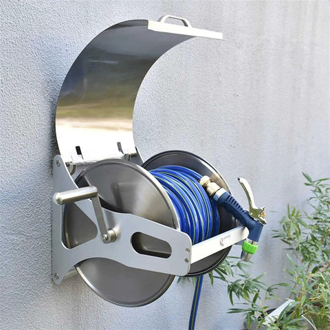 Heavy Duty Stainless Steel Garden Hose Reel Wall Or Floor Mount Auto Retract with blue hose and brass fittings installed.