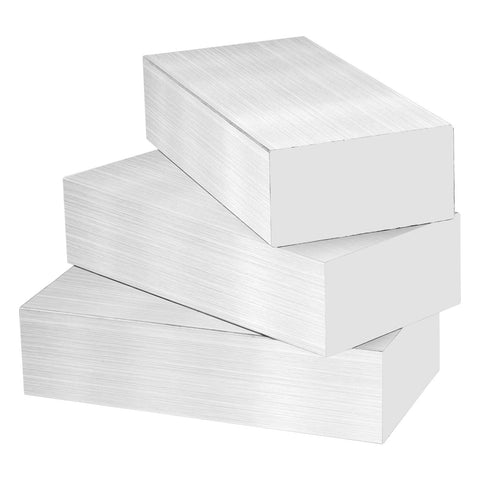 Four aluminum solid stock blocks, 4 x 2 x 1 inches, brushed finish, stacked