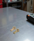 2 Pack Rig Ready Rod End Bearings 14 MM And 9 16 Female Thread Tie Rod Ball Joints on metal table.
