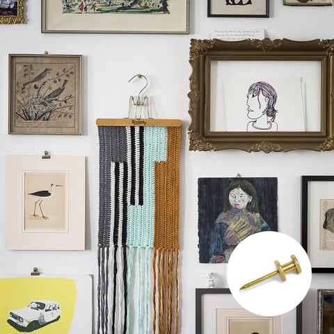 Heavy Duty Double Headed Picture Hangers And Thumb Tacks Pack Of Fifty Pieces For Hassle Free Wall Mounting With A Rock Solid Grip, shown with framed artwork.