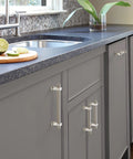 Kitchen with cabinets featuring Carrigan Polished Nickel Cabinet Pull Three And Three Quarters Inch Center To Center 96mm