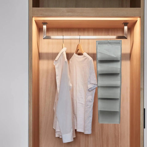 Roomy Over Door Hanging Shoe Storage Organizer Built Tough With Nonwoven Multi Pocket Closet Wardrobe Bag For Straightforward Space Saving Home Organization Essentials in a closet.