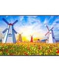 Top Tier Sixty Five Inch Commercial Monitor Providing Rock Solid Performance And Zero Hassle Configuration Ships Fully Equipped With Heavy Duty Wall Mounting Brackets For Office Use showing colorful windmills in flower field.
