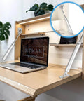 Heavy Duty Gas Struts 150N 33LBS for Drop Down Doors installed on a wooden desk, showing pneumatic lift spring function.