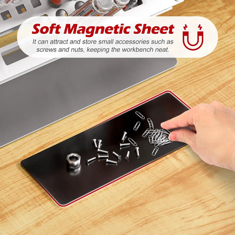 Hand using soft magnetic sheet on Premium Screwdriver Organizer Holder For Desktop Tools, holding screws and clips.