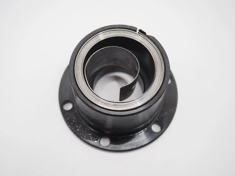Heavy Duty Solid Steel Clock Spring Housing Assembly For Milling Machines showing top view of spiral coil and black metal base.