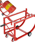 Heavy Duty Rolling Drum Cradle With Ride Like Butter Wheels And Ergo Grip Handle 600 Lb Capacity Steel Barrel Cart For 55 Gallon Barrels in use with a barrel.