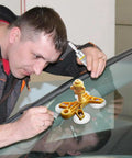 Person using Windshield Crack Repair Kit for Cars, Quick Glass Fix Tool for Auto Glass on car windshield.
