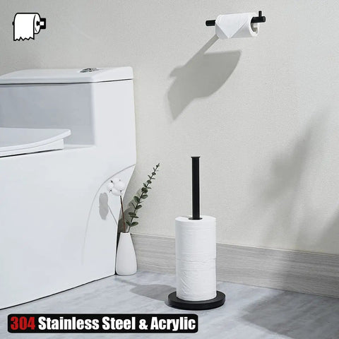 Matte Black Stainless Steel Toilet Paper Storage Stand That Holds 3 Rolls Thick Zero Point Eight Millimeter Frame Built Tough Prevents Rust Easy Clean Bathroom Organizer Dispenser next to toilet.