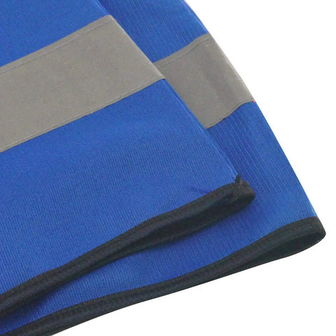 Close-up of blue vests with reflective tape, different from 10 Pack Hi Visibility Safety Vests For Adults With Reflective Tape Bright Orange Color.