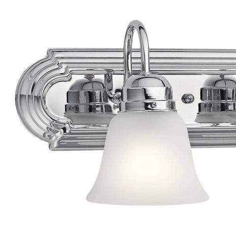 Five Light Bathroom Vanity Fixture, Traditional 36-Inch Bar With Satin Etched Glass Shades In Tannery Bronze, close-up view.