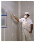 Worker in white overalls using Half Facepiece Disposable Respirator Assembly 53P71 NIOSH Approved Organic Vapor P95 Respiratory Protection