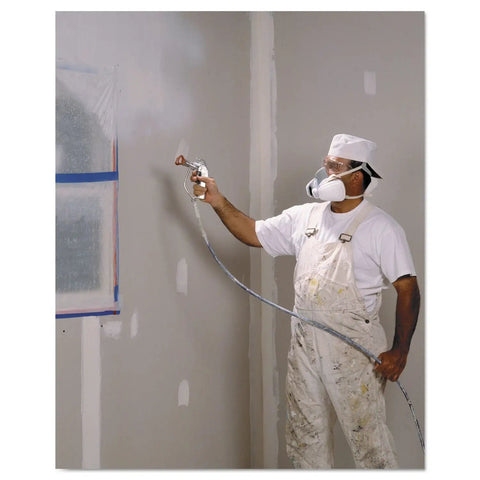Worker in white overalls using Half Facepiece Disposable Respirator Assembly 53P71 NIOSH Approved Organic Vapor P95 Respiratory Protection