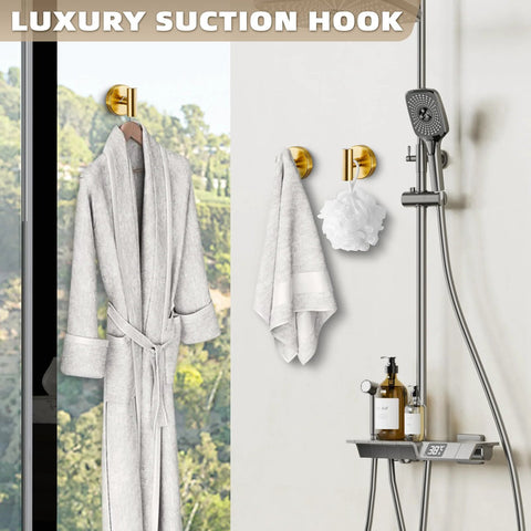 Suction Cup Hooks For Shower And Kitchen No Drill Mounting Brushed Gold Finish holding robe and towel in bathroom