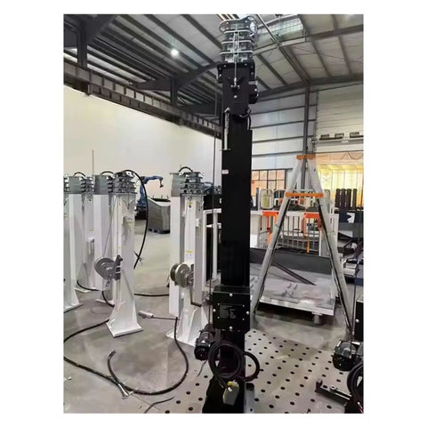 Electric Hydraulic Telescopic Mast Aluminum Push Up Antenna Pole in warehouse, featuring a heavy duty base and hydraulic drive.