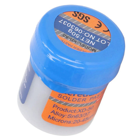 Close-up of No Clean Solder Paste Sn63 Leaded Flux 50g Jar with blue lid, details on usage for SMT Patch and Electronic Repair.
