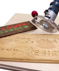 Universal 11 Piece Metal Bushing Router Template Guide Set in use with wooden sign projects showing floral and design text.