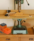 37 Piece Alphabet And Number Stamp Set With Heart Symbols for Imprinting on metal plastic wood shown next to wooden drill press