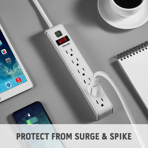Six Outlet Surge Protector Power Strip With Four Foot Extension Cord, 600 Joules Surge Protection, 14 AWG Cable in use on desk